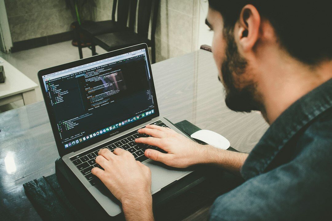programmer writing insurance code