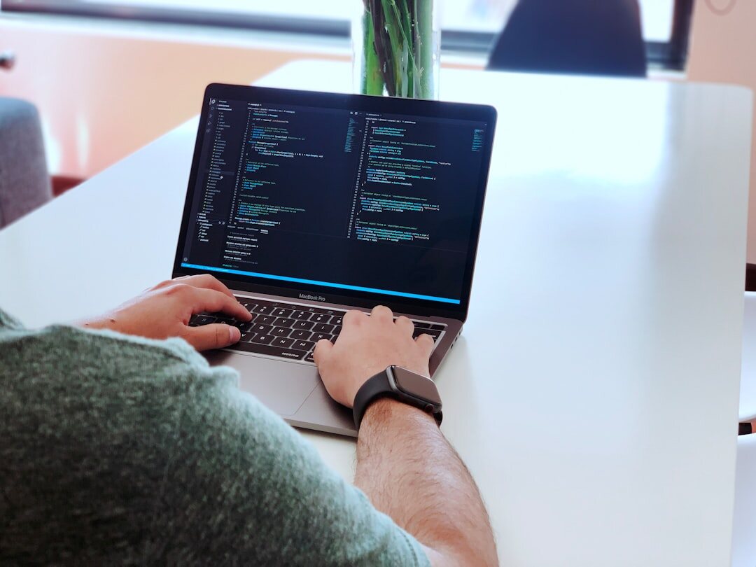 programmer writing insurance code
